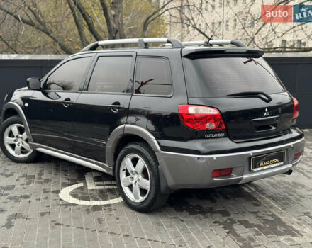 Черный Мицубиси Аутлендер, объемом двигателя 2.4 л и пробегом 242 тыс. км за 6800 $, фото 15 на Automoto.ua