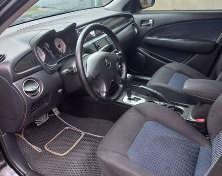 Черный Мицубиси Аутлендер, объемом двигателя 2.4 л и пробегом 256 тыс. км за 6900 $, фото 10 на Automoto.ua