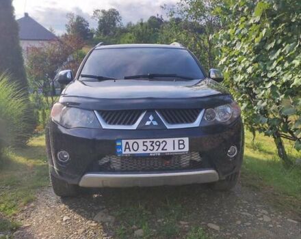 Чорний Міцубісі Аутлендер, об'ємом двигуна 2 л та пробігом 283 тис. км за 9000 $, фото 1 на Automoto.ua