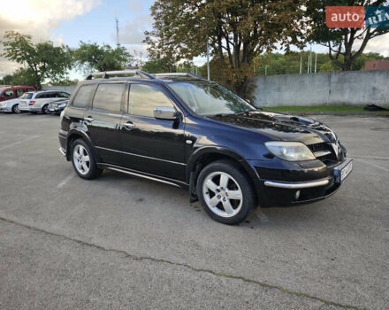 Чорний Міцубісі Аутлендер, об'ємом двигуна 2 л та пробігом 207 тис. км за 6900 $, фото 1 на Automoto.ua