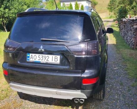 Чорний Міцубісі Аутлендер, об'ємом двигуна 2 л та пробігом 283 тис. км за 9000 $, фото 16 на Automoto.ua