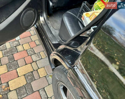 Чорний Міцубісі Аутлендер, об'ємом двигуна 2.38 л та пробігом 247 тис. км за 5499 $, фото 13 на Automoto.ua