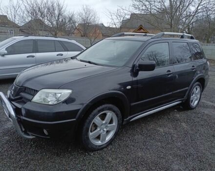 Черный Мицубиси Аутлендер, объемом двигателя 2 л и пробегом 200 тыс. км за 5100 $, фото 12 на Automoto.ua