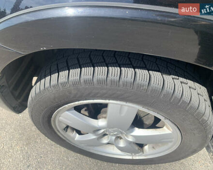 Черный Мицубиси Аутлендер, объемом двигателя 2 л и пробегом 212 тыс. км за 6000 $, фото 35 на Automoto.ua