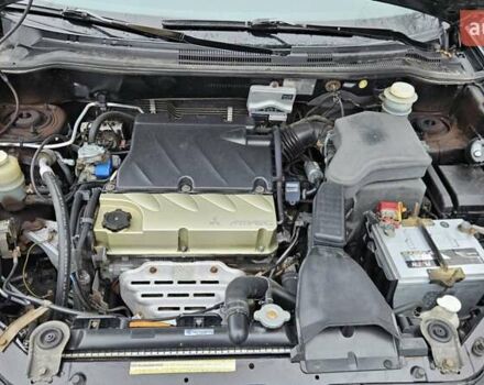 Черный Мицубиси Аутлендер, объемом двигателя 2.4 л и пробегом 167 тыс. км за 6150 $, фото 29 на Automoto.ua