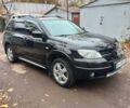 Черный Мицубиси Аутлендер, объемом двигателя 2.4 л и пробегом 256 тыс. км за 6900 $, фото 2 на Automoto.ua
