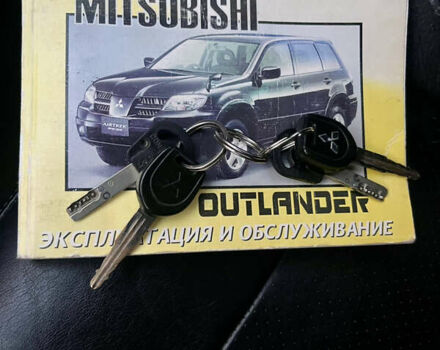 Чорний Міцубісі Аутлендер, об'ємом двигуна 2.38 л та пробігом 247 тис. км за 5499 $, фото 70 на Automoto.ua