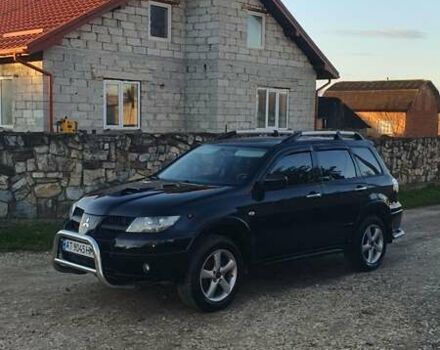 Міцубісі Аутлендер 2006 у Івано-Франківську на Automoto.ua Чорний Міцубісі Аутлендер, об'ємом двигуна 2 л та пробігом 263 тис. км за 7250 $, фото 11 на Automoto.ua