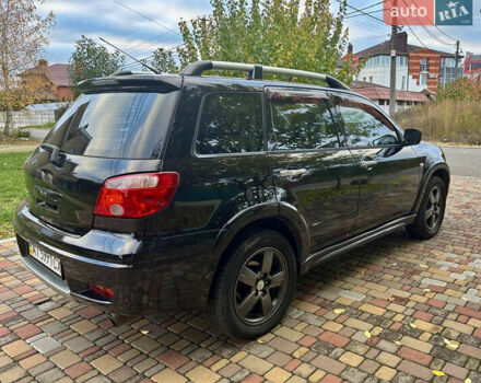 Чорний Міцубісі Аутлендер, об'ємом двигуна 2.38 л та пробігом 247 тис. км за 5499 $, фото 26 на Automoto.ua