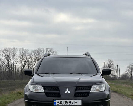 Черный Мицубиси Аутлендер, объемом двигателя 2 л и пробегом 230 тыс. км за 6300 $, фото 11 на Automoto.ua