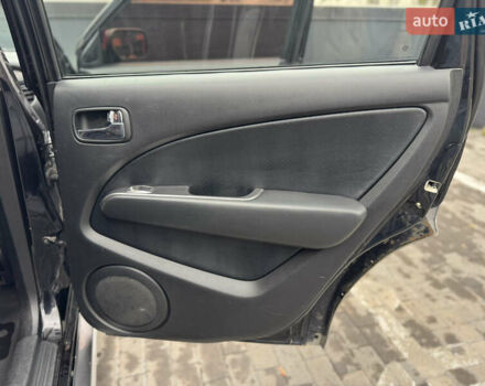 Черный Мицубиси Аутлендер, объемом двигателя 2.4 л и пробегом 242 тыс. км за 6800 $, фото 46 на Automoto.ua