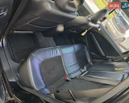 Чорний Міцубісі Аутлендер, об'ємом двигуна 2 л та пробігом 207 тис. км за 6900 $, фото 11 на Automoto.ua
