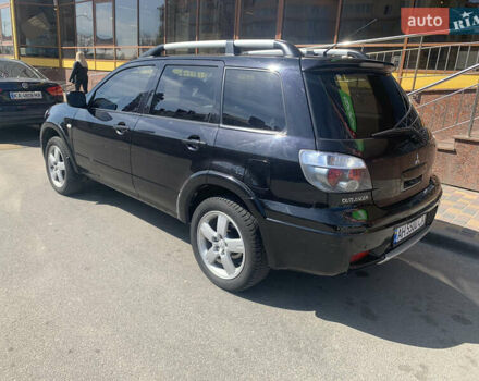 Черный Мицубиси Аутлендер, объемом двигателя 2 л и пробегом 212 тыс. км за 6000 $, фото 3 на Automoto.ua