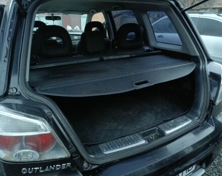 Черный Мицубиси Аутлендер, объемом двигателя 2 л и пробегом 200 тыс. км за 5100 $, фото 19 на Automoto.ua