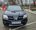 Черный Мицубиси Аутлендер, объемом двигателя 2.4 л и пробегом 167 тыс. км за 6150 $, фото 6 на Automoto.ua