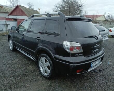 Черный Мицубиси Аутлендер, объемом двигателя 2 л и пробегом 200 тыс. км за 5100 $, фото 14 на Automoto.ua