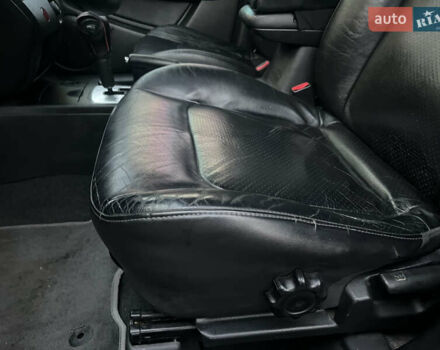 Чорний Міцубісі Аутлендер, об'ємом двигуна 2.38 л та пробігом 247 тис. км за 5499 $, фото 47 на Automoto.ua