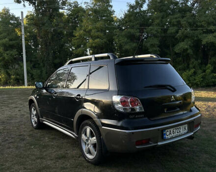 Мицубиси Аутлендер 2006 в Чернобае на Automoto.ua Черный Мицубиси Аутлендер, объемом двигателя 2.38 л и пробегом 278 тыс. км за 5300 $, фото 4 на Automoto.ua