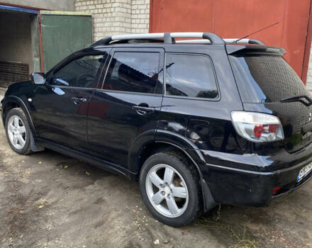 Міцубісі Аутлендер 2006 у Конотопе на Automoto.ua Чорний Міцубісі Аутлендер, об'ємом двигуна 2 л та пробігом 257 тис. км за 5800 $, фото 10 на Automoto.ua