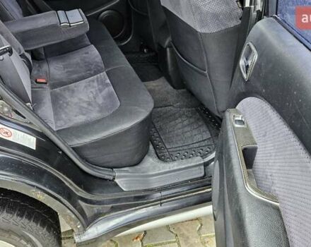 Черный Мицубиси Аутлендер, объемом двигателя 2.4 л и пробегом 167 тыс. км за 6150 $, фото 15 на Automoto.ua