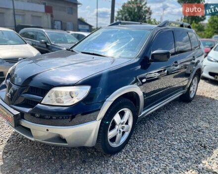 Черный Мицубиси Аутлендер, объемом двигателя 2.4 л и пробегом 270 тыс. км за 5999 $, фото 3 на Automoto.ua