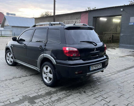 Черный Мицубиси Аутлендер, объемом двигателя 2 л и пробегом 280 тыс. км за 4999 $, фото 9 на Automoto.ua