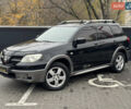Черный Мицубиси Аутлендер, объемом двигателя 2.4 л и пробегом 242 тыс. км за 6800 $, фото 2 на Automoto.ua