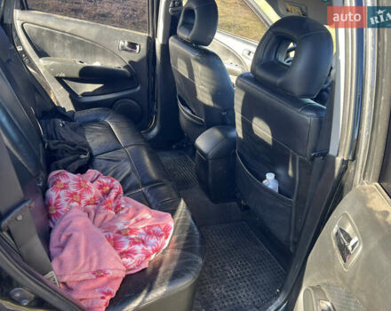 Черный Мицубиси Аутлендер, объемом двигателя 2.38 л и пробегом 230 тыс. км за 5350 $, фото 11 на Automoto.ua