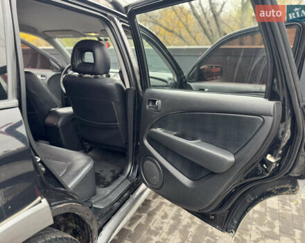 Черный Мицубиси Аутлендер, объемом двигателя 2.4 л и пробегом 242 тыс. км за 6800 $, фото 45 на Automoto.ua