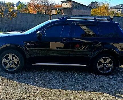 Міцубісі Аутлендер 2006 у Дніпро (Дніпропетровську) на Automoto.ua Чорний Міцубісі Аутлендер, об'ємом двигуна 2.4 л та пробігом 265 тис. км за 7500 $, фото 4 на Automoto.ua
