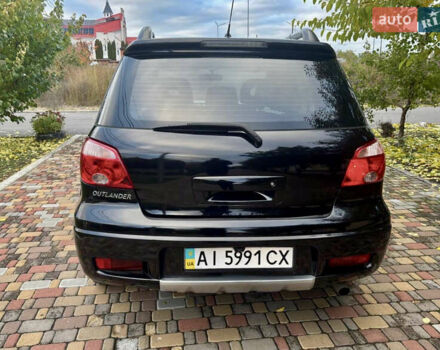 Чорний Міцубісі Аутлендер, об'ємом двигуна 2.38 л та пробігом 247 тис. км за 5499 $, фото 16 на Automoto.ua