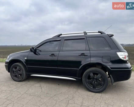 Черный Мицубиси Аутлендер, объемом двигателя 2 л и пробегом 230 тыс. км за 6300 $, фото 5 на Automoto.ua