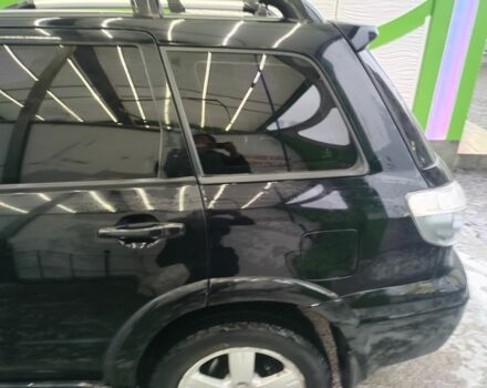 Чорний Міцубісі Аутлендер, об'ємом двигуна 2.4 л та пробігом 360 тис. км за 5200 $, фото 3 на Automoto.ua