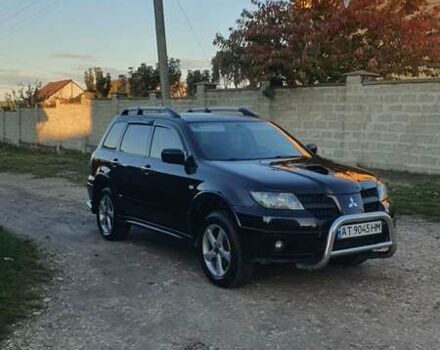 Міцубісі Аутлендер 2006 у Івано-Франківську на Automoto.ua Чорний Міцубісі Аутлендер, об'ємом двигуна 2 л та пробігом 263 тис. км за 7250 $, фото 10 на Automoto.ua