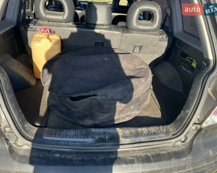 Черный Мицубиси Аутлендер, объемом двигателя 2.38 л и пробегом 230 тыс. км за 5350 $, фото 12 на Automoto.ua