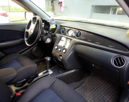 Черный Мицубиси Аутлендер, объемом двигателя 2.4 л и пробегом 240 тыс. км за 5700 $, фото 3 на Automoto.ua