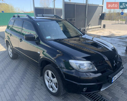 Черный Мицубиси Аутлендер, объемом двигателя 2 л и пробегом 212 тыс. км за 6000 $, фото 9 на Automoto.ua