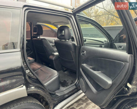 Черный Мицубиси Аутлендер, объемом двигателя 2.4 л и пробегом 242 тыс. км за 6800 $, фото 44 на Automoto.ua