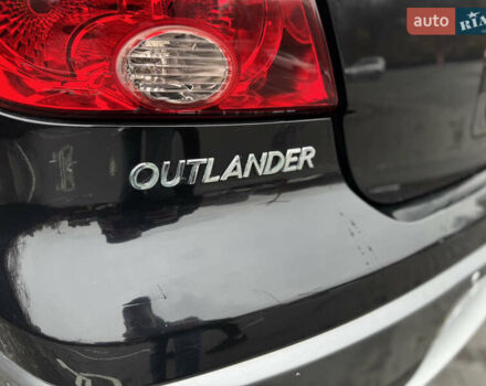 Черный Мицубиси Аутлендер, объемом двигателя 2.4 л и пробегом 242 тыс. км за 6800 $, фото 18 на Automoto.ua