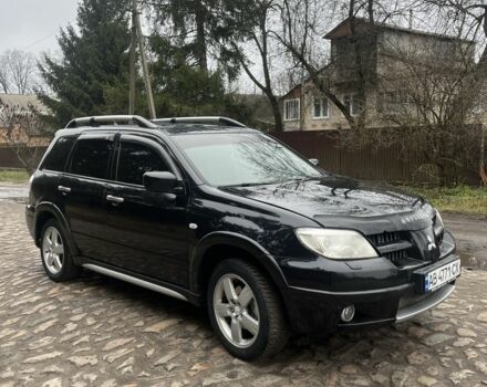 Черный Мицубиси Аутлендер, объемом двигателя 2.4 л и пробегом 310 тыс. км за 5300 $, фото 5 на Automoto.ua