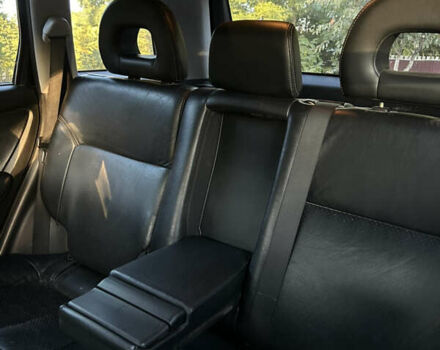 Мицубиси Аутлендер 2006 в Чернобае на Automoto.ua Черный Мицубиси Аутлендер, объемом двигателя 2.38 л и пробегом 278 тыс. км за 5300 $, фото 7 на Automoto.ua