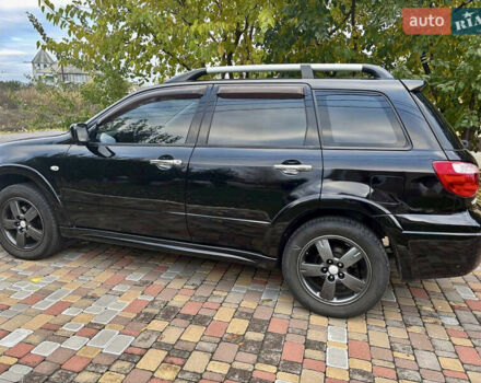 Чорний Міцубісі Аутлендер, об'ємом двигуна 2.38 л та пробігом 247 тис. км за 5499 $, фото 10 на Automoto.ua