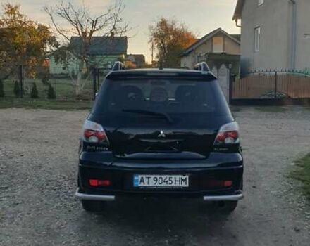 Міцубісі Аутлендер 2006 у Івано-Франківську на Automoto.ua Чорний Міцубісі Аутлендер, об'ємом двигуна 2 л та пробігом 263 тис. км за 7250 $, фото 15 на Automoto.ua
