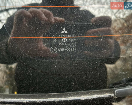 Чорний Міцубісі Аутлендер, об'ємом двигуна 2.38 л та пробігом 247 тис. км за 5499 $, фото 74 на Automoto.ua