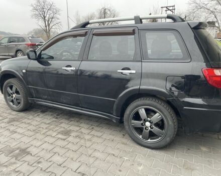 Черный Мицубиси Аутлендер, объемом двигателя 2.4 л и пробегом 234 тыс. км за 5499 $, фото 14 на Automoto.ua