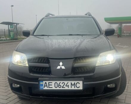 Чорний Міцубісі Аутлендер, об'ємом двигуна 2.4 л та пробігом 277 тис. км за 6700 $, фото 2 на Automoto.ua
