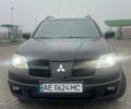 Чорний Міцубісі Аутлендер, об'ємом двигуна 2.4 л та пробігом 277 тис. км за 6700 $, фото 2 на Automoto.ua
