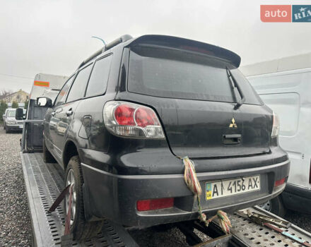 Черный Мицубиси Аутлендер, объемом двигателя 2.4 л и пробегом 240 тыс. км за 2200 $, фото 14 на Automoto.ua