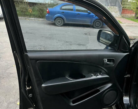 Чорний Міцубісі Аутлендер, об'ємом двигуна 2.38 л та пробігом 247 тис. км за 5499 $, фото 44 на Automoto.ua