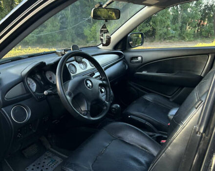 Мицубиси Аутлендер 2006 в Чернобае на Automoto.ua Черный Мицубиси Аутлендер, объемом двигателя 2.38 л и пробегом 278 тыс. км за 5300 $, фото 6 на Automoto.ua